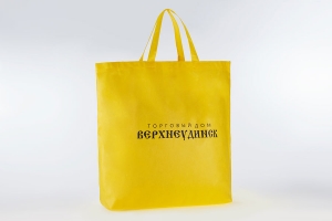 Желтая промо сумка с обьемным дном из спанбонда, логотип черного цвета.